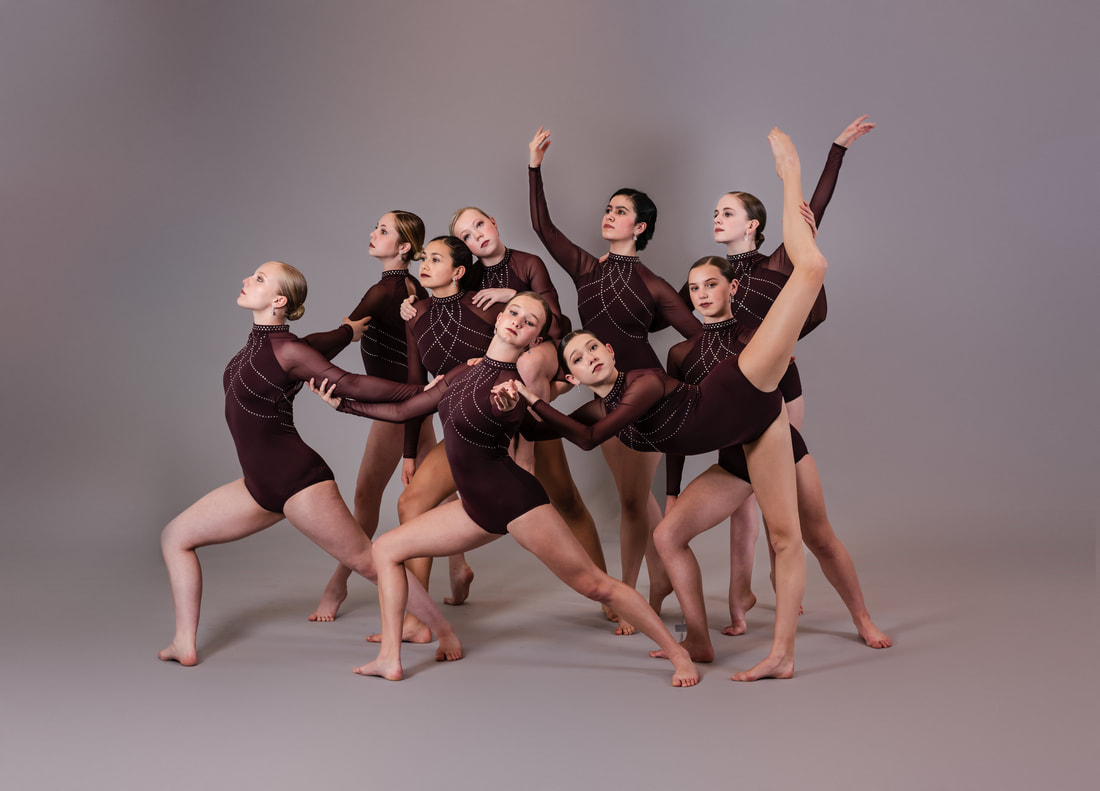 Group of modern ballet dancers in black bodysuit in white studio Stock  Photo - Alamy